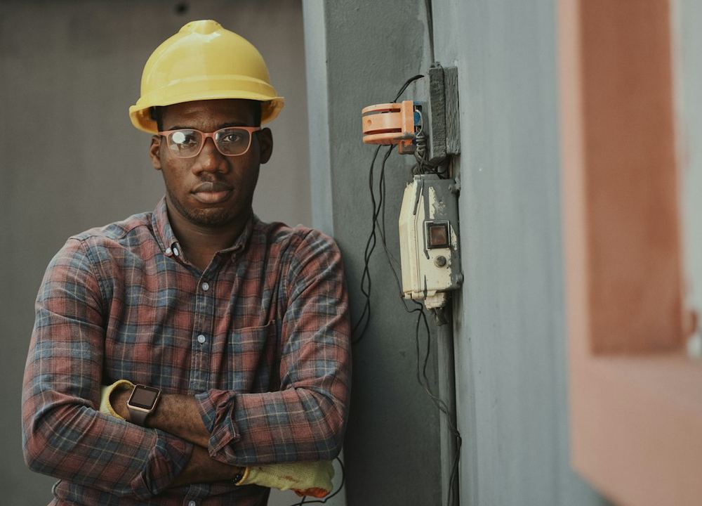 Electrical panels being inspected by a technician