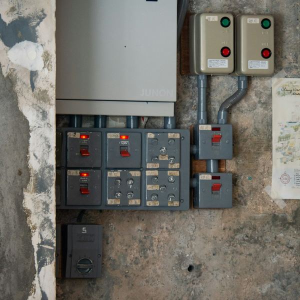 Electrical control panel with switches and buttons